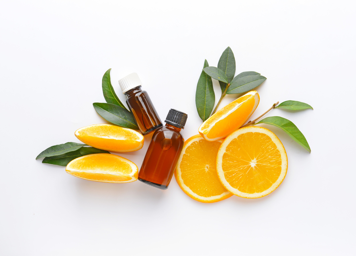 Orange Essential Oil on White Background